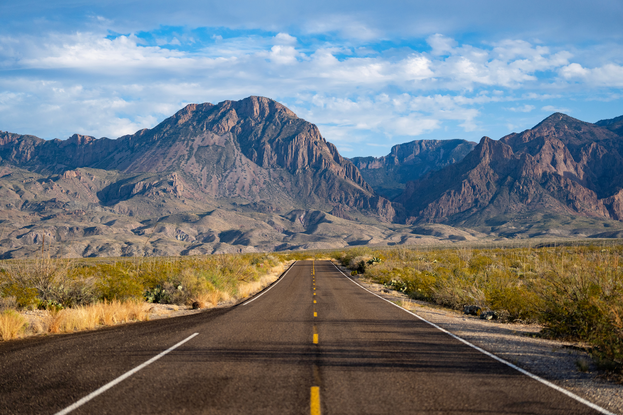 A highway heading toward a mountain